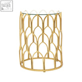 Merlin gold leaf side table with gold-toned metal frame and clear glass top featuring arched lattice design