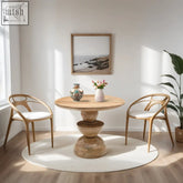 Round mango wood dining table with stacked pedestal base and natural white wash finish perfect for dining rooms