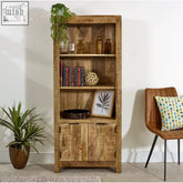 Rustic merlin mango wooden bookcase with 2 doors featuring natural wood tones and ample storage space for books and decor