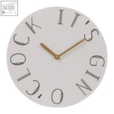 White wall clock with black art deco cursive lettering and gold hands in mimo gin clock design