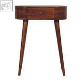 A sleek oval mini albion chestnut wooden side table with a single drawer and tapered legs for stylish storage
