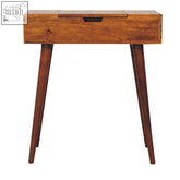 A warm-toned mango wood mini chestnut fold vanity chest of drawers with a foldable mirror and clever compartments
