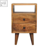 Mini oak-ish classic open bedside table with two drawers, honey-toned wood, tapered legs, and dark metal knobs