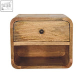 A rustic light brown mango wood mini oak-ish floating open bedside table with a single drawer and rounded edges