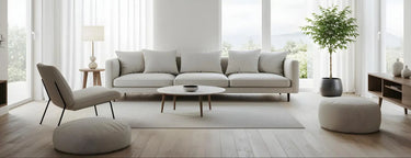 Minimalist beige sectional sofa with clean lines and matching throw pillows.