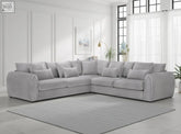 A sleek light gray plush velvet sectional sofa with modern design and large corner shape perfect for lounging