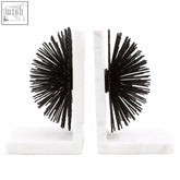 White marble bookends with two black starburst decorative elements from mirano set of two black finish starburst bookends