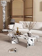 White marble coffee table with black veining and sleek metallic legs for modern luxury mirbel coffee table design