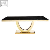 Moda black faux marble rectangular dining table with sleek curved gold metal base for stylish dining spaces