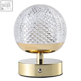 A modern gold rechargeable touch dimmable table lamp with a clear faceted crystal globe and patterned glass shade