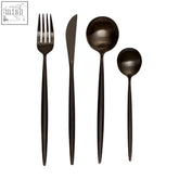 Modern retro 16 piece matte black cutlery set with stainless steel fork knife and spoons in sleek matte finish