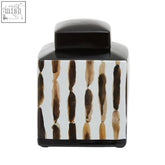 Black ceramic small ceramic jar with glossy finish and vertical brown beige brushstroke patterns on sides