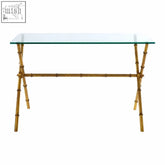 Gold-finished monroe console table with bamboo-style frame and clear glass top for stylish entryways or living rooms