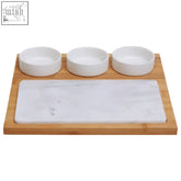 White marble serving board with marble insert and three matching white ceramic bowls from monzaro set