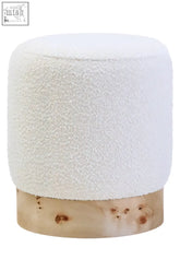 White plush cream boucle round stool with a natural burl wood base and distinctive wood grain patterns