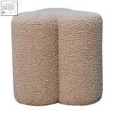 Beige mud boucle clover footstool with soft faux fur texture and rounded edges perfect for cozy seating