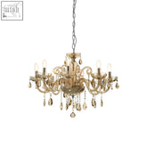 Gold-toned murano 8 bulb cognac glass chandelier with intricate crystal droplets and ornate arms for elegant lighting