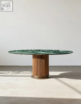 Murcell oval dining table with a sleek round green marble top and fluted wooden base perfect dining table