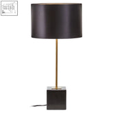 Murdoch black table lamp with a black linen shade on a slender gold stem and square black marble base