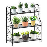 Black metal 3 tier plant stand with crisscross supports and curved handles for indoor outdoor use