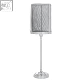 Chrome finished myles table lamp with a cylindrical mesh shade perfect for modern home lighting