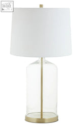 Clear glass table lamp with a white fabric shade and brass accents featuring a white fabric shade design