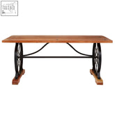 Rustic nandri acacia wood dining table with black wrought iron carved feet and ornate wheel designs