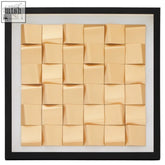 Beige abstract nason gold carving wall art with 3d geometric raised square tiles in a black frame for wall decor