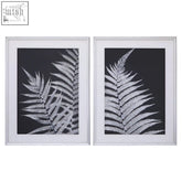 Set of two leaf print wall art with white frames and black ground featuring detailed fern designs for stylish decor