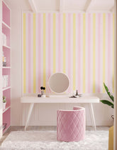 Pink quilted velvet cylindrical stool named neapolitan with a soft texture that complements ice cream wallpaper décor