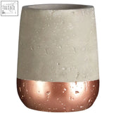 Neptune tumbler concrete toothbrush holder with matte grey upper half and glossy rose gold band with speckled texture