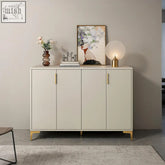 Cream-colored minimalist neriah shoe storage with gold-tone handles and legs perfect for contemporary shoe storage