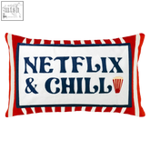 Rectangular needlepoint cushion with red and white striped border and netflix and chill embroidery with popcorn icon