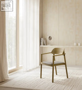 Minimalist nimma chair with light gold wooden frame and upholstered seat perfect for modern interiors