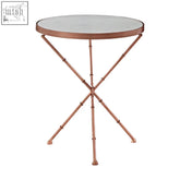 Round nirav cross leg table with white marble top and copper bamboo style cross leg base