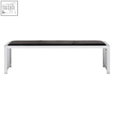 Modern black leather bench with sleek seat and minimalist stainless steel frame perfect for stylish seating