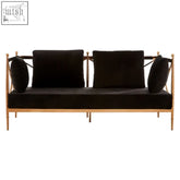 Black velvet novo 2 seat sofa with rose gold lattice arms and matching black throw pillows