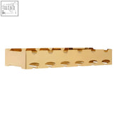 Novo 6 bottle gold finish wine rack with gold-colored rectangular wall-mounted glass slots for multiple wine glasses