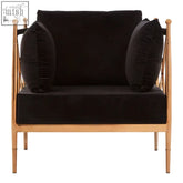 Black velvet novo chair with rose gold metal arms and matching throw pillows for stylish living rooms