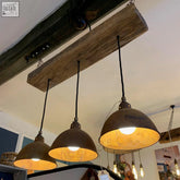 Rustic industrial oak beam chandelier with distressed bronze metal shades and warm efficient led lighting for kitchen island
