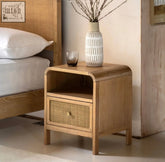 Light wood oakham bedside cabinet with woven rattan drawer front and curved top edge bedside cabinet