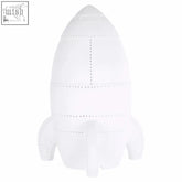White ceramic night light shaped like a rocket with perforated details and pointed nose cone for kids room lighting