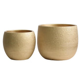 Two gold ceramic plant pots with textured woven pattern olly and rose barcelona indoor outdoor planters