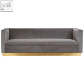 Opal 3 seat grey sofa with modern grey velvet upholstery channel tufting and sleek warm metallic base