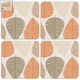 Set of four orange cork coasters with modern leaf motifs in orange beige and gray on a cream background