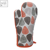 A cozy single oven glove with a playful orange leaf pattern in coral gray and white on a light background