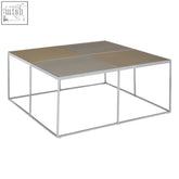 Oria coffee table with stainless steel chrome frame and four warm gold brown glass top panels