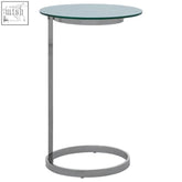 Modern side table with sleek chrome frame and white marble effect glass top for stylish living spaces