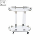 Chrome finished oria oval mirrored trolley with two glass shelves and clear acrylic legs for stylish bar serving