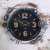 Orika industrial wall clock with black face copper numerals exposed gears and pipes in steampunk industrial wall design